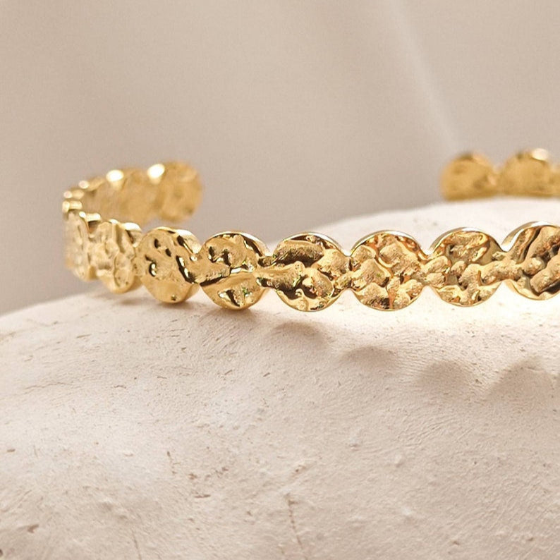 Waterproof gold bangle with organic design
