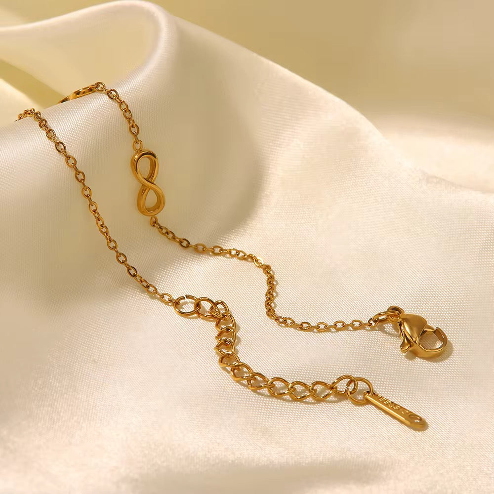 Adjustable infinity bracelet with extender chain