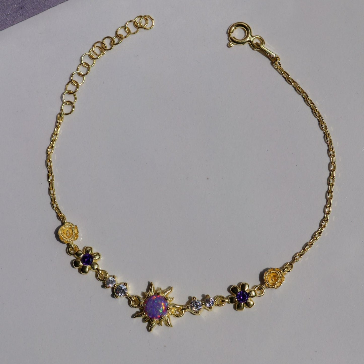 Adjustable opal bracelet with floral design in silver