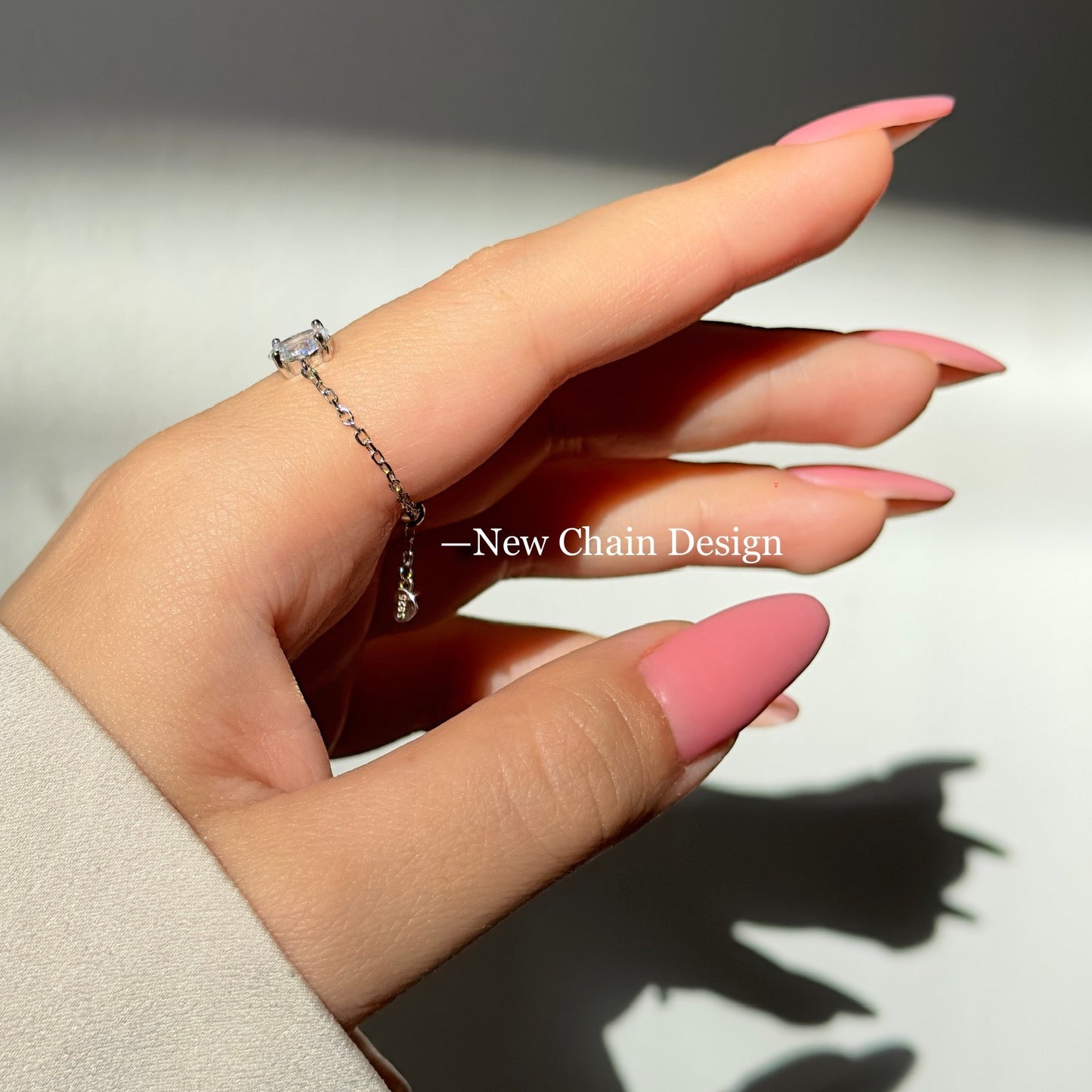 Adjustable silver chain ring with diamond detail