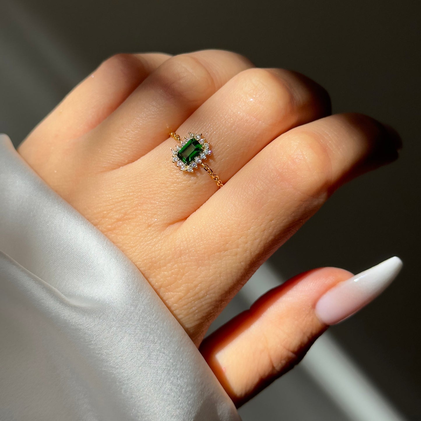 Vintage Halo adjustable chain ring with emerald or garnet stone