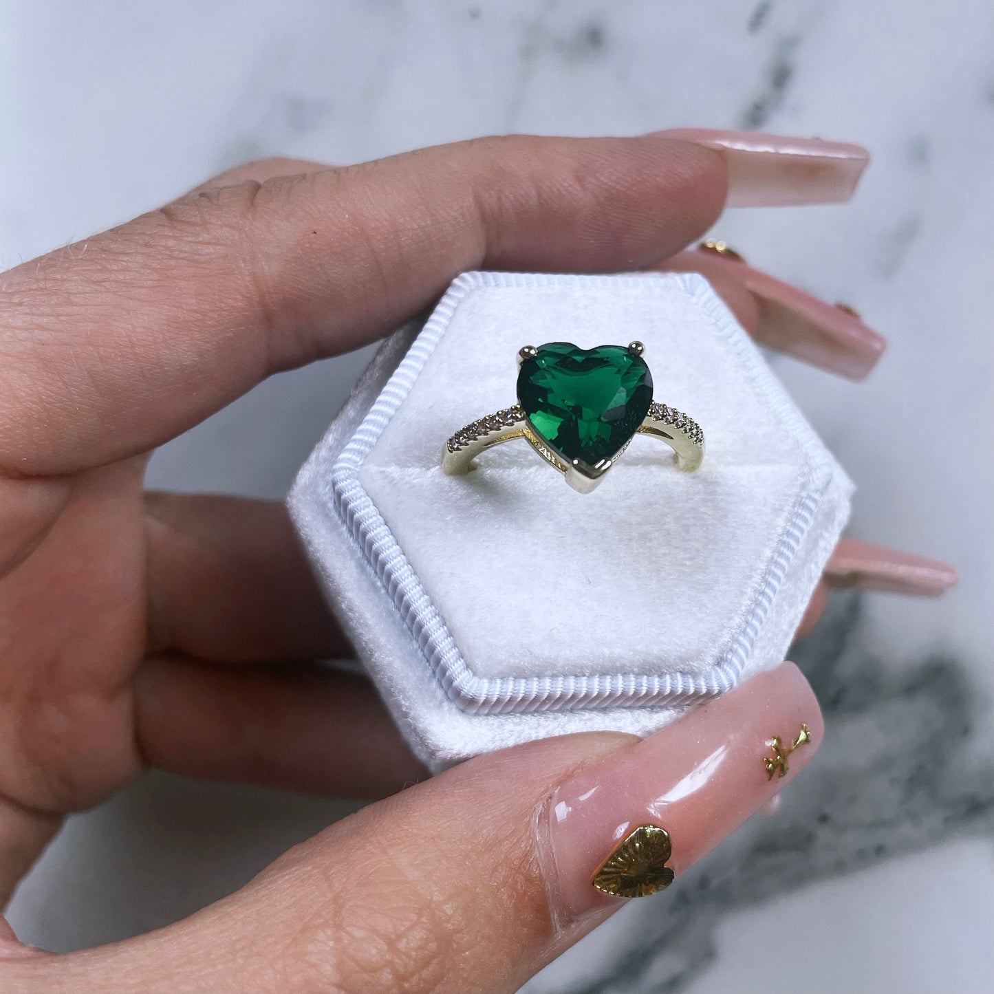 Amour ring with heart design displayed in gift box