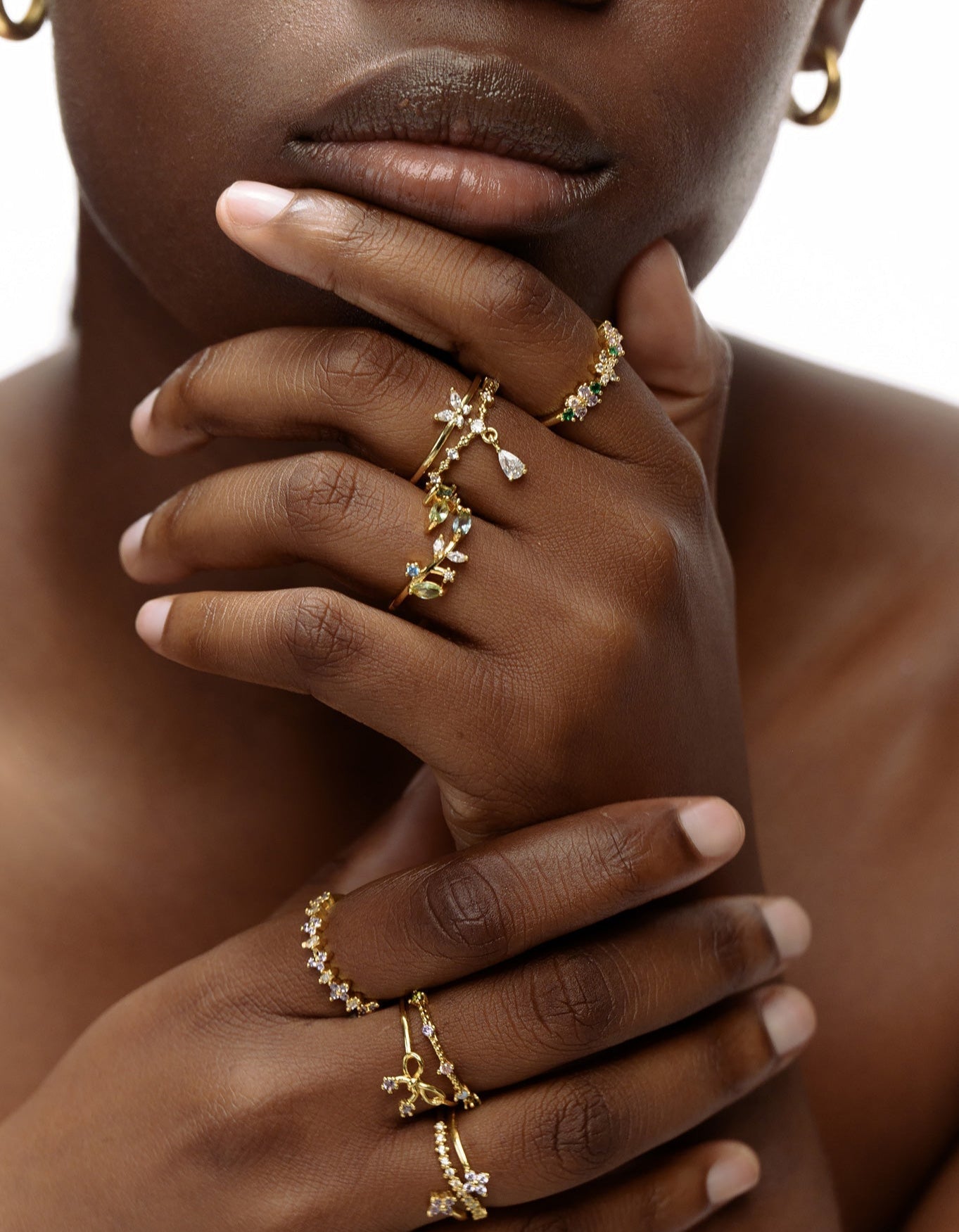 Close-up of bow tie ring with 18K gold finish