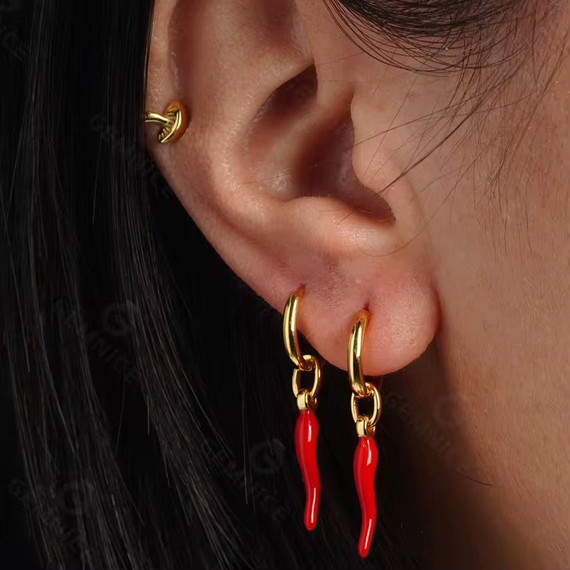 Detail of waterproof chili pepper earrings – gold plated
