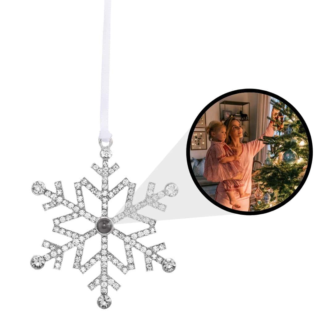 Christmas tree decorated with custom photo ornament