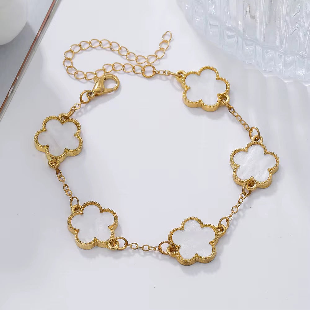 Stacked bracelets look with flower clover design – Loveness