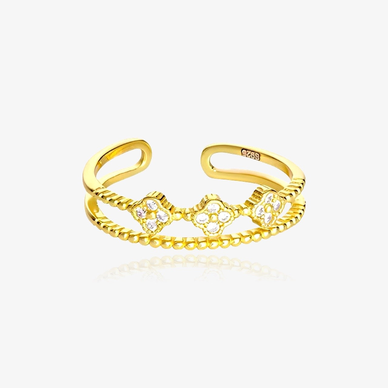 Clover wrap ring worn on hand – gold plated version