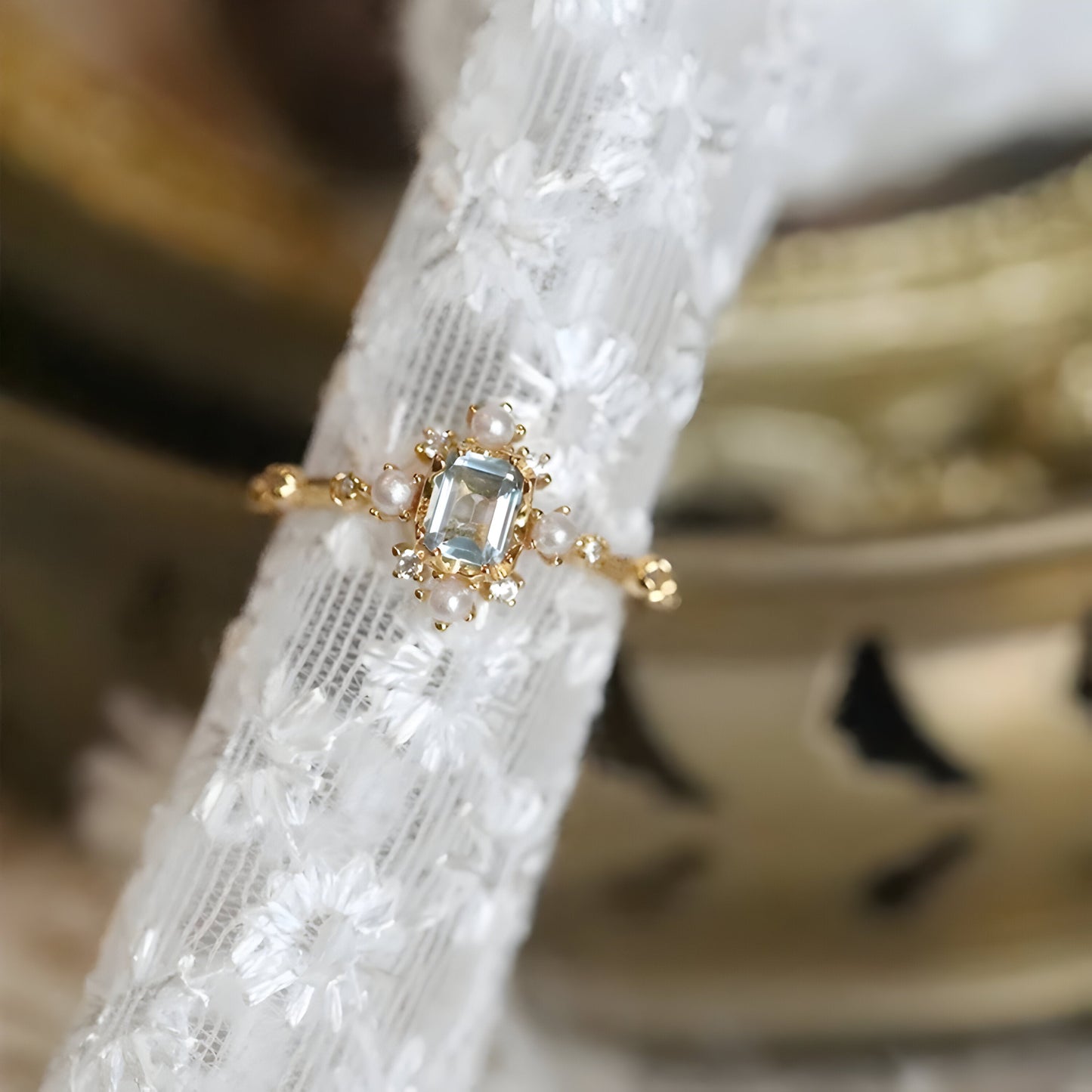 Close-up showing the pearl and crystal details