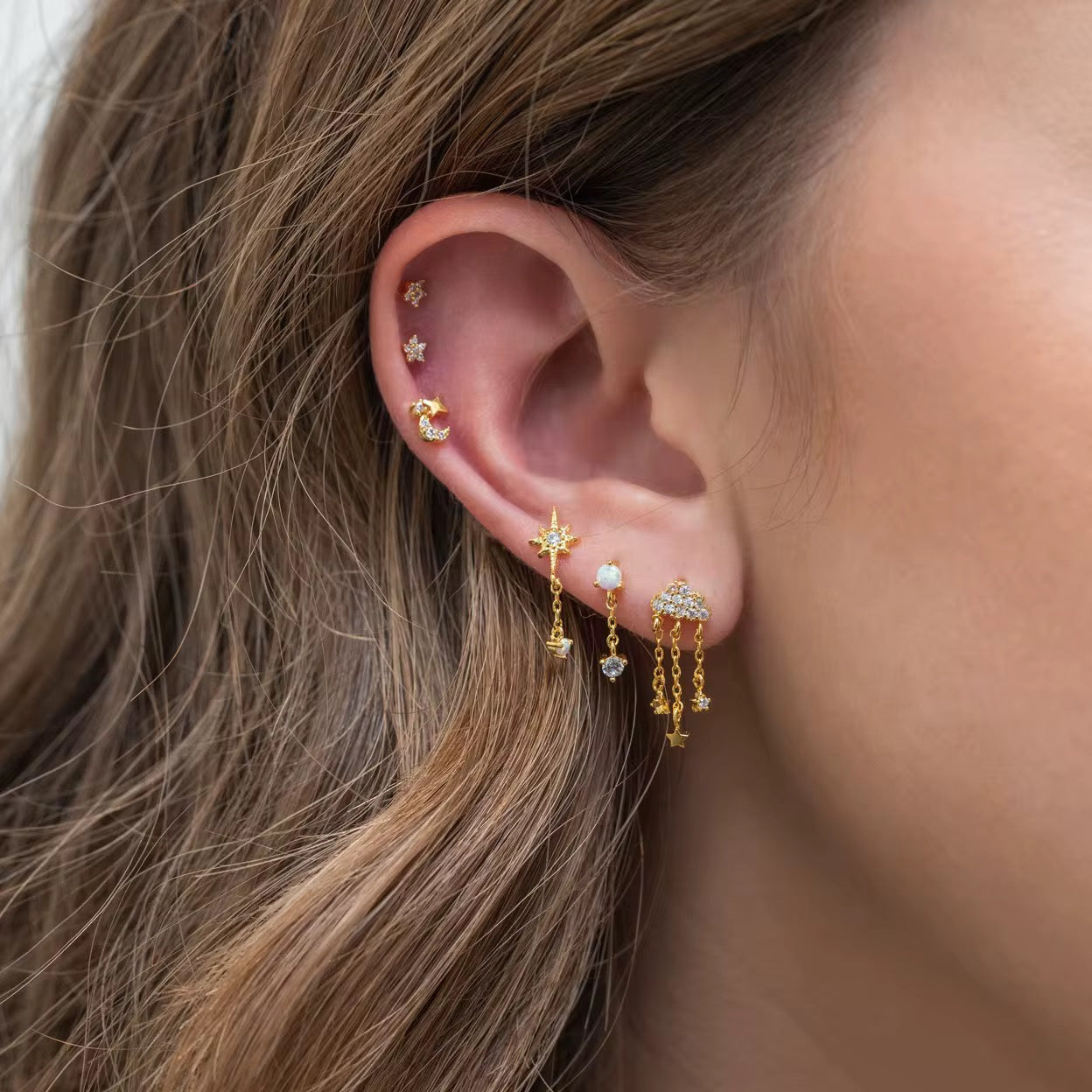 Dainty cloud earrings in gold and silver finish