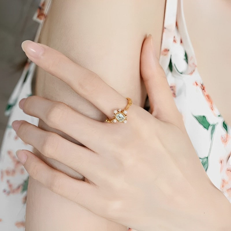 Dainty Crystal & Pearl ring stacked with other gold rings