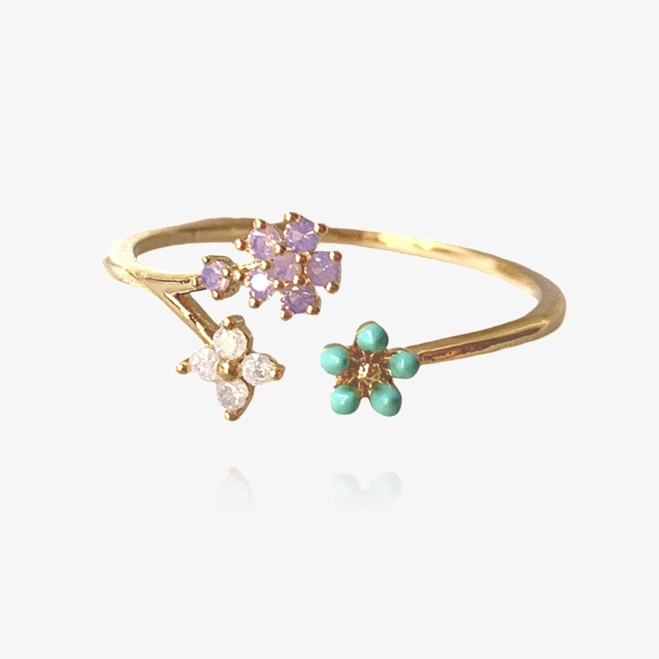 Dainty floral ring with crystals in gold – front view