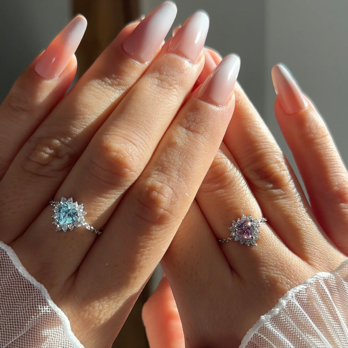 Close-up of blue heart zirconia on adjustable Queen of Hearts chain ring