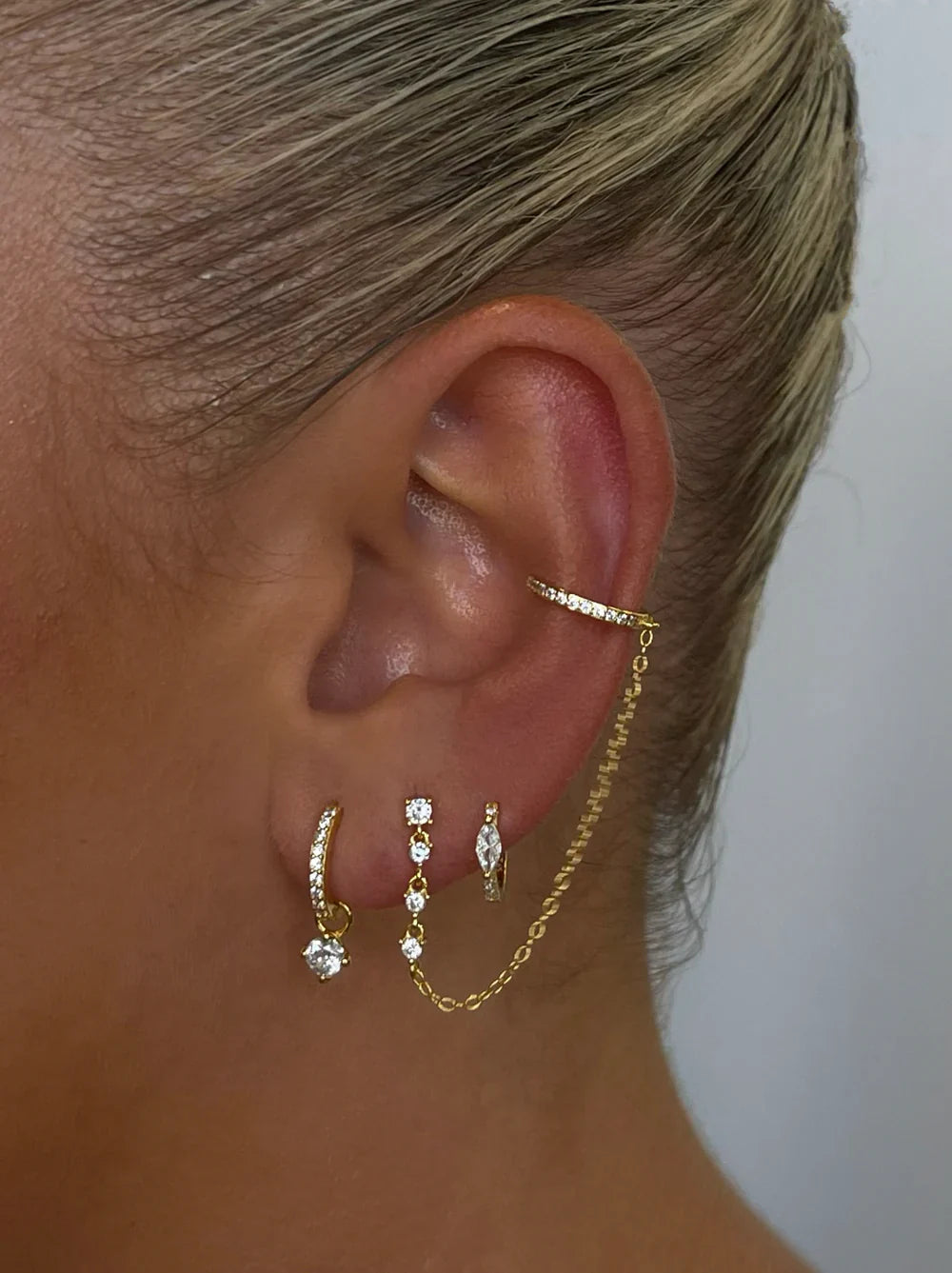 Model wearing Diamond Cuff earrings set