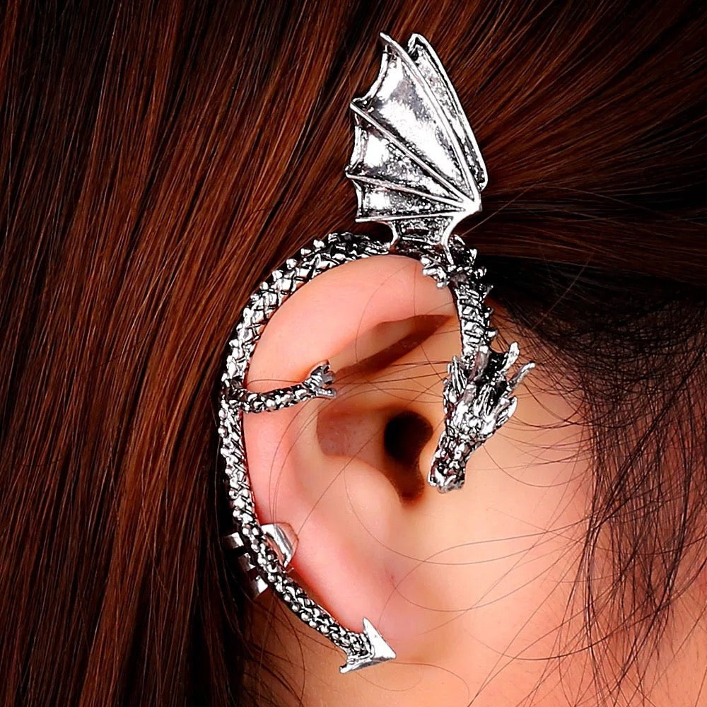 Front view of dragon ear cuff for Halloween in silver