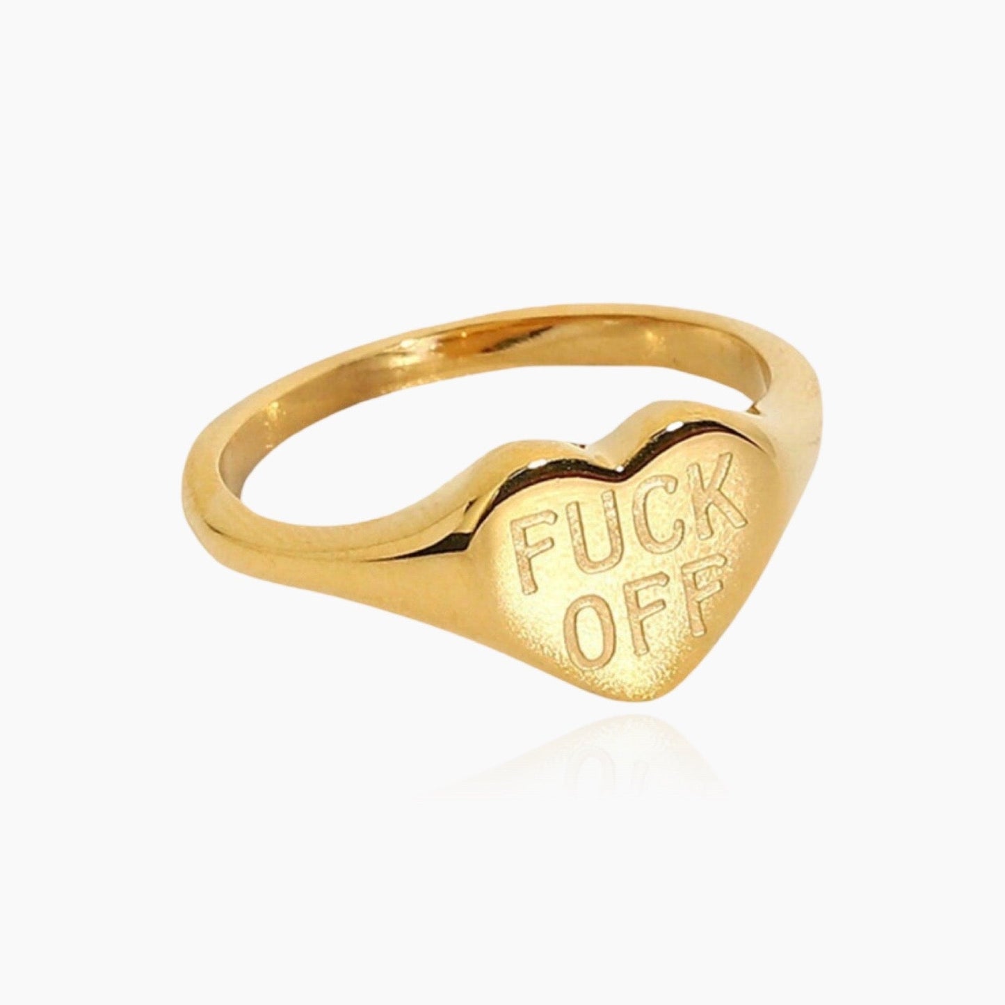 Front view of gold Fck Off ring on white background
