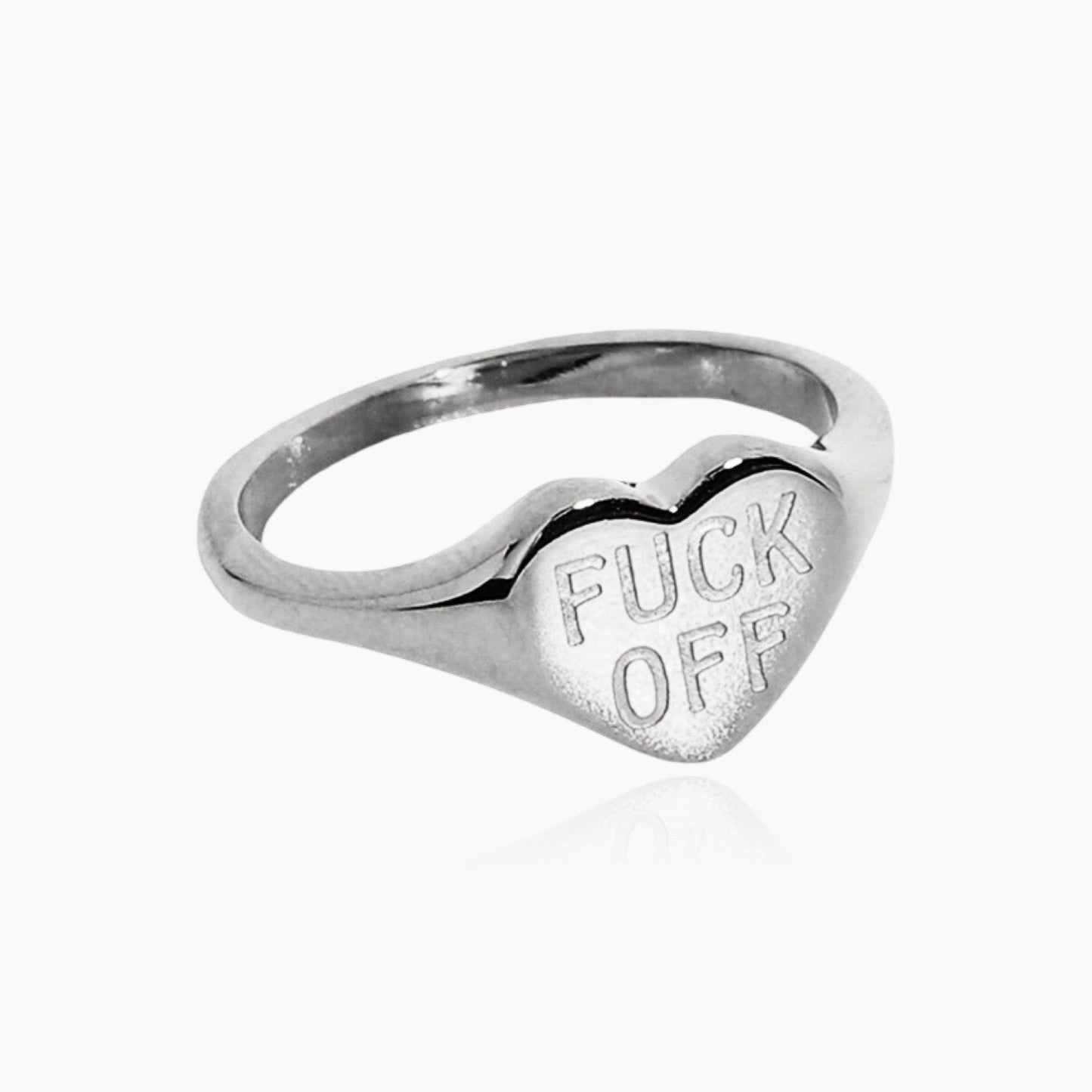 Fck Off ring styled with other bold rings