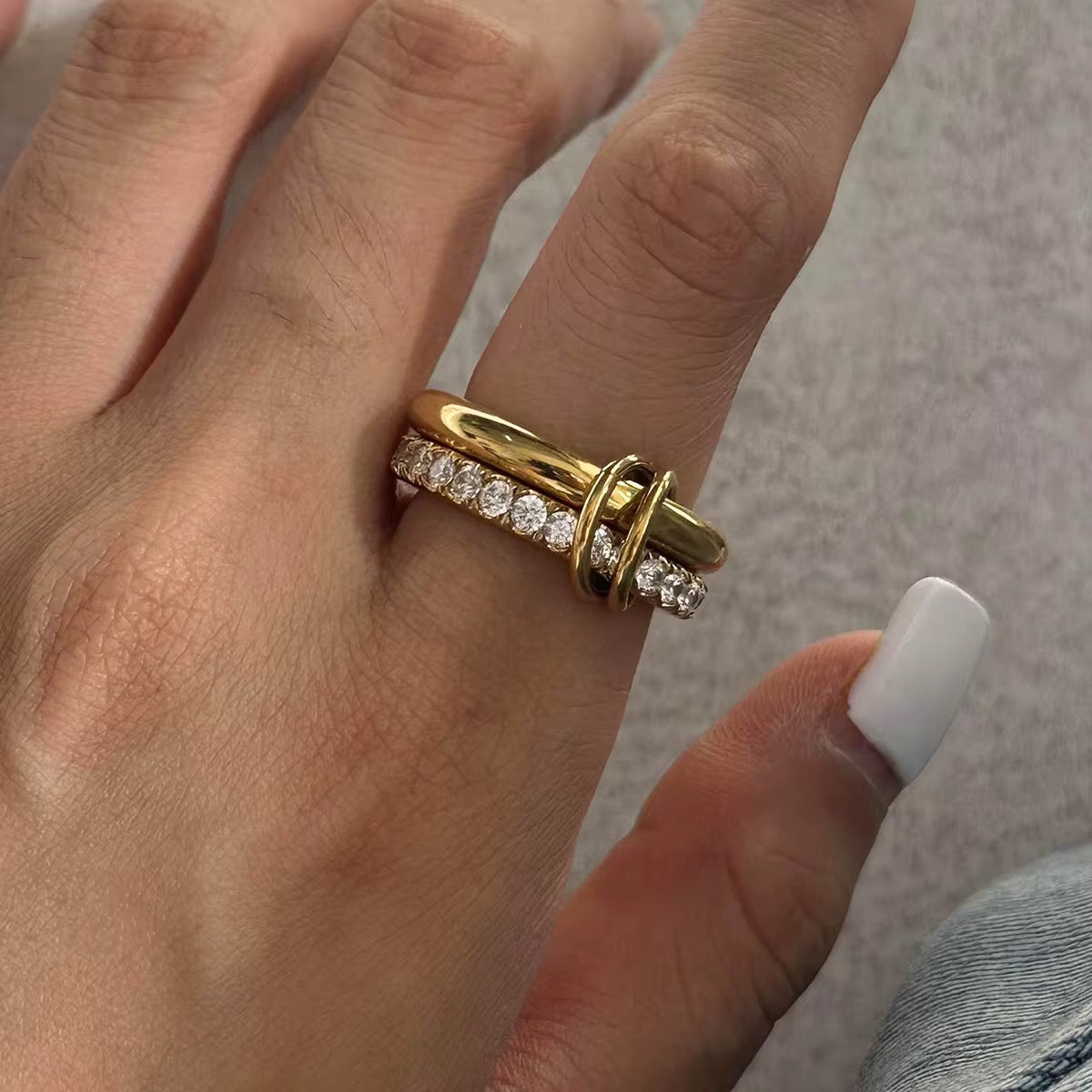 Double crystal fidget ring worn on hand