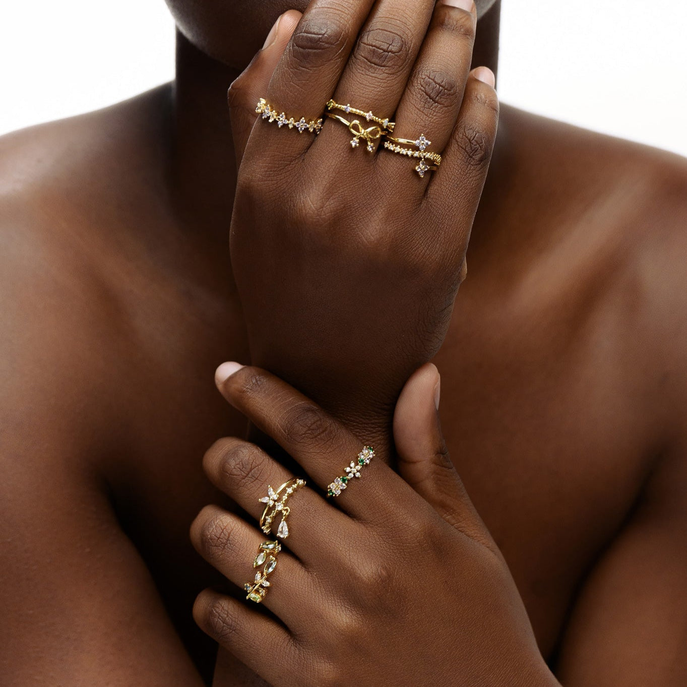 Close-up of floral arch ring with 18K gold plating