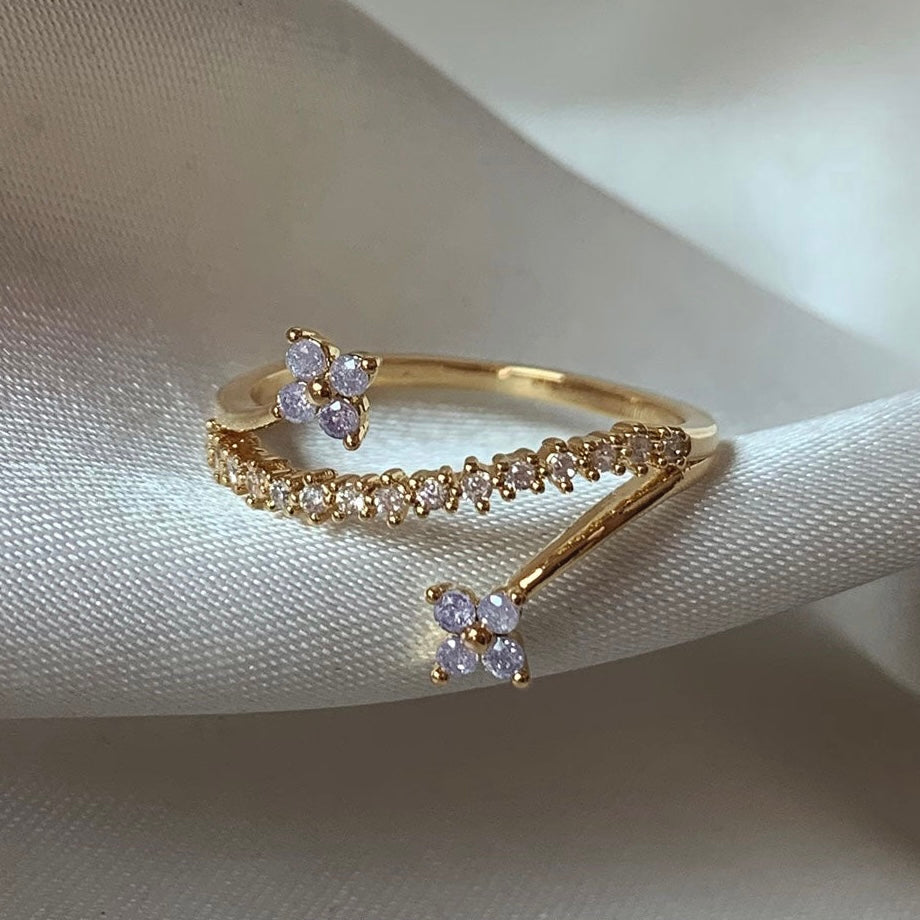Dainty flower arch ring worn on hand