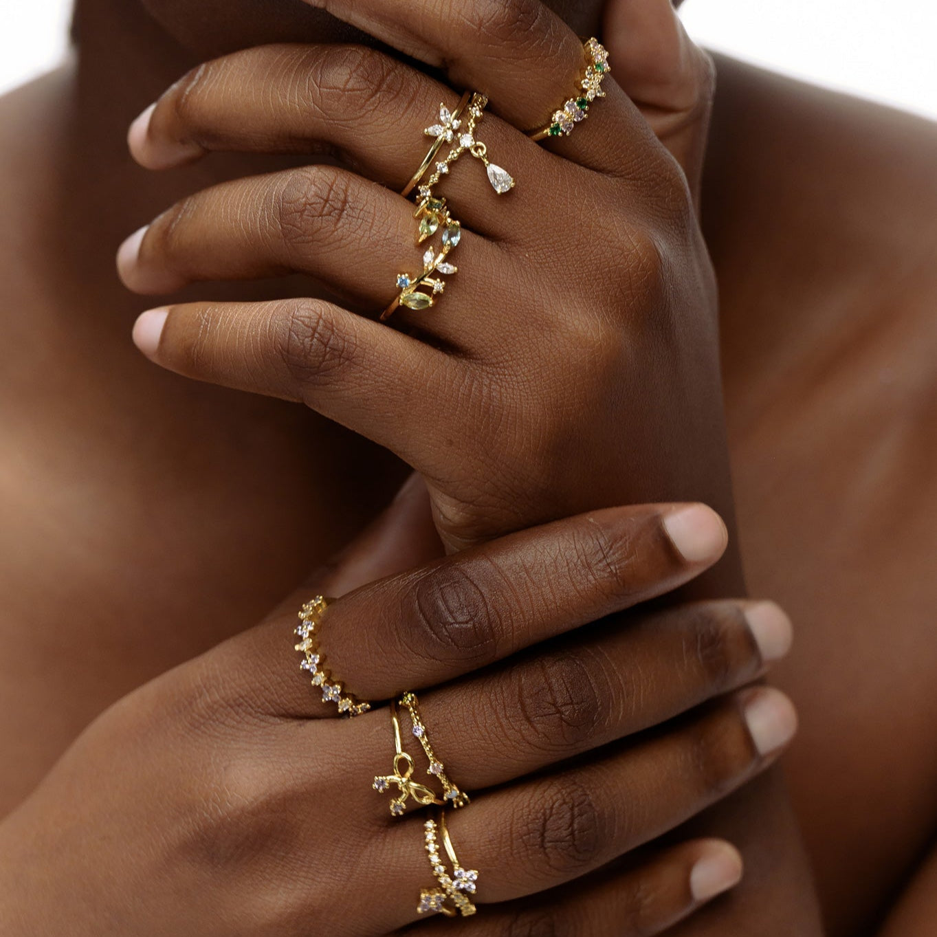Flower arch ring stacked with other rings