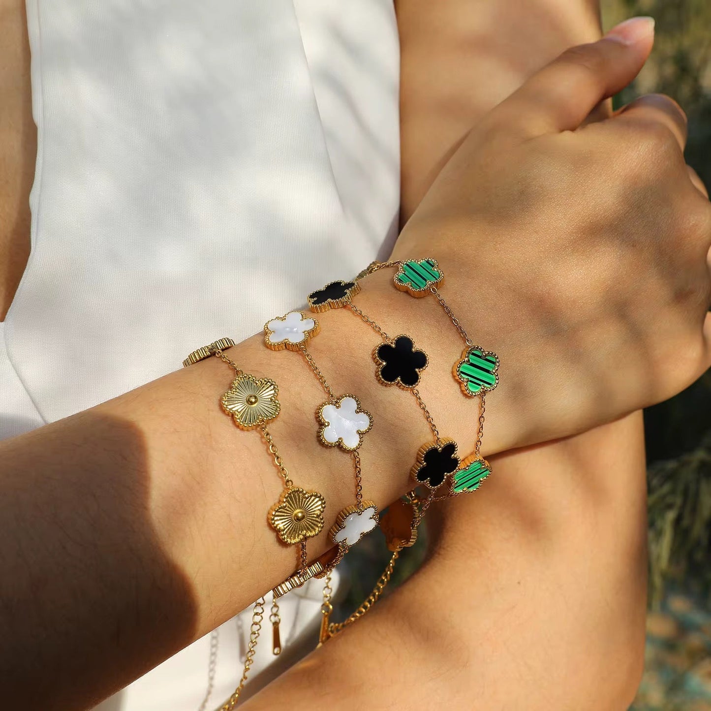 Silver waterproof clover bracelet with delicate flower design – Loveness