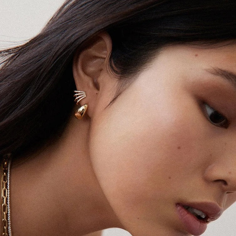 Close-up of pavé crystals on multi hoop earrings