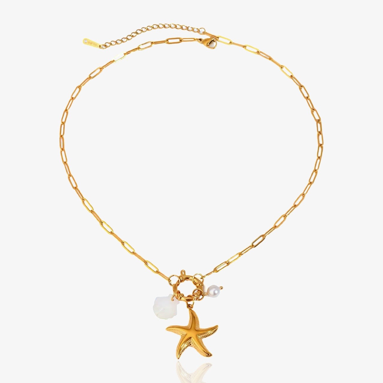 Detail of gold Starfish Charms Necklace with pearl