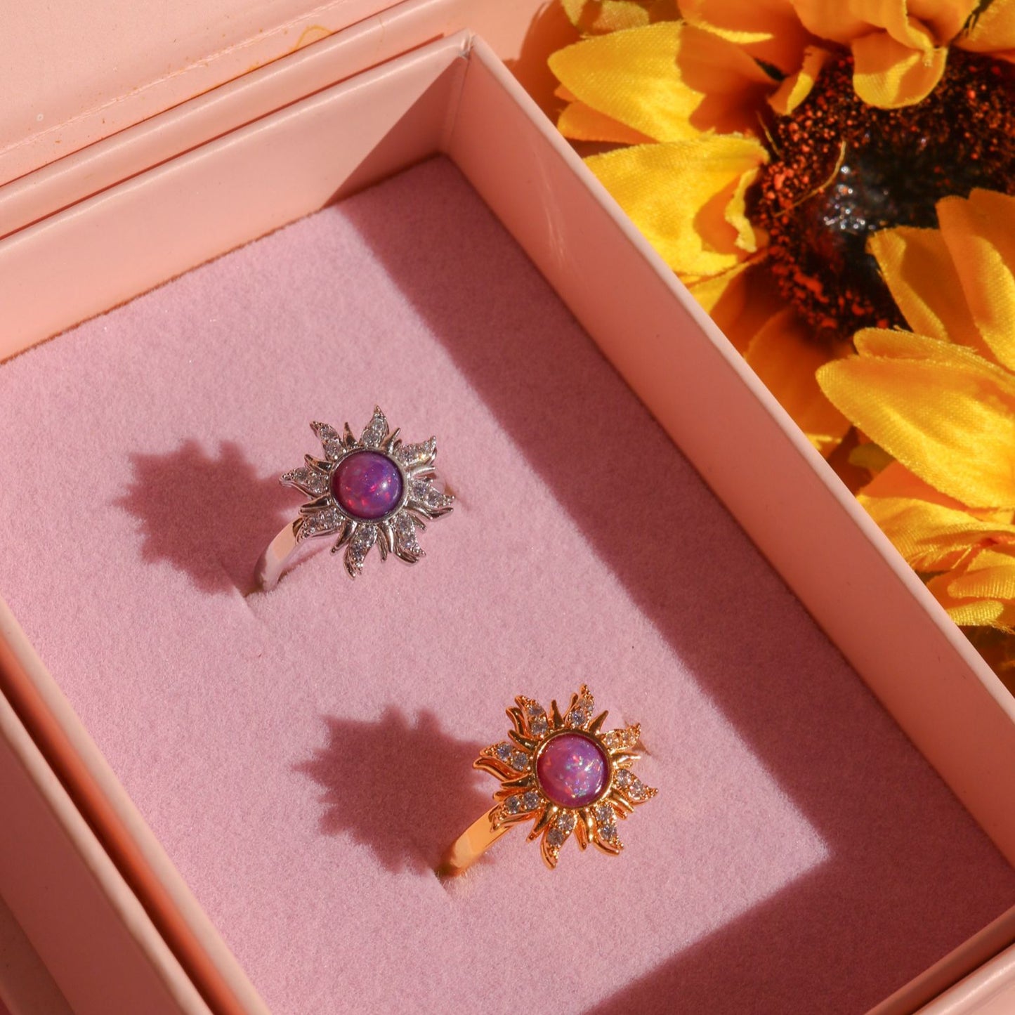 Handcrafted spinning sun ring with white zircon