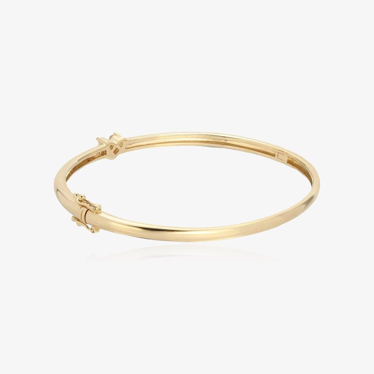 Heart bangle stacked with other bracelets – elegant and trendy – Loveness