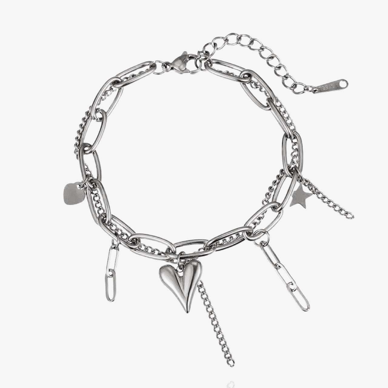 Heart charm bracelet worn on wrist – dainty look