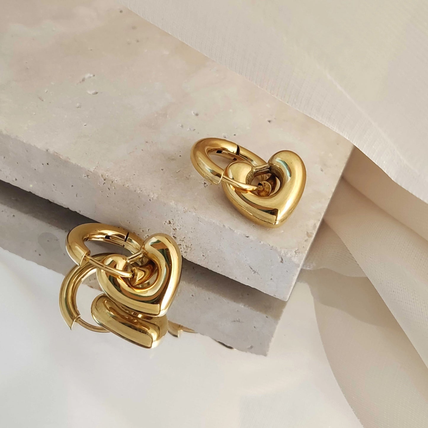 Convertible heart earrings with and without charms