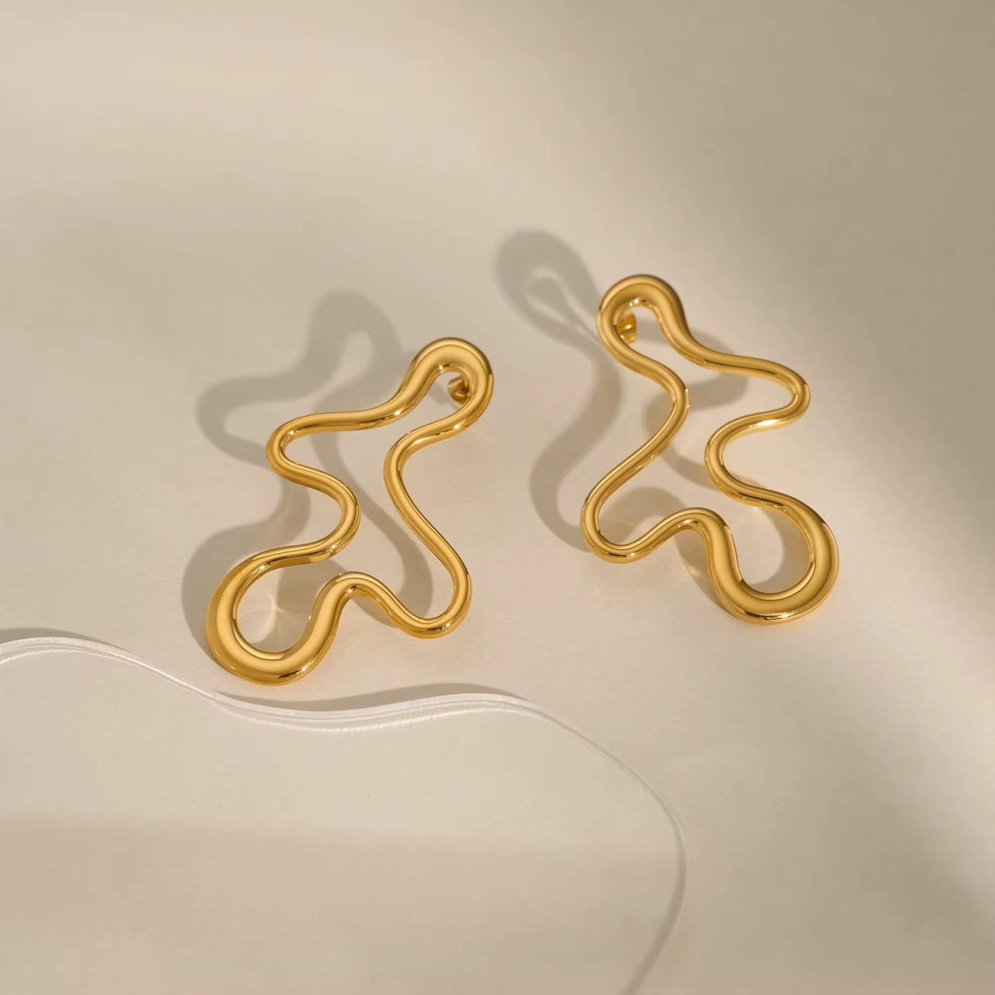 Close-up of lightweight modern art earrings
