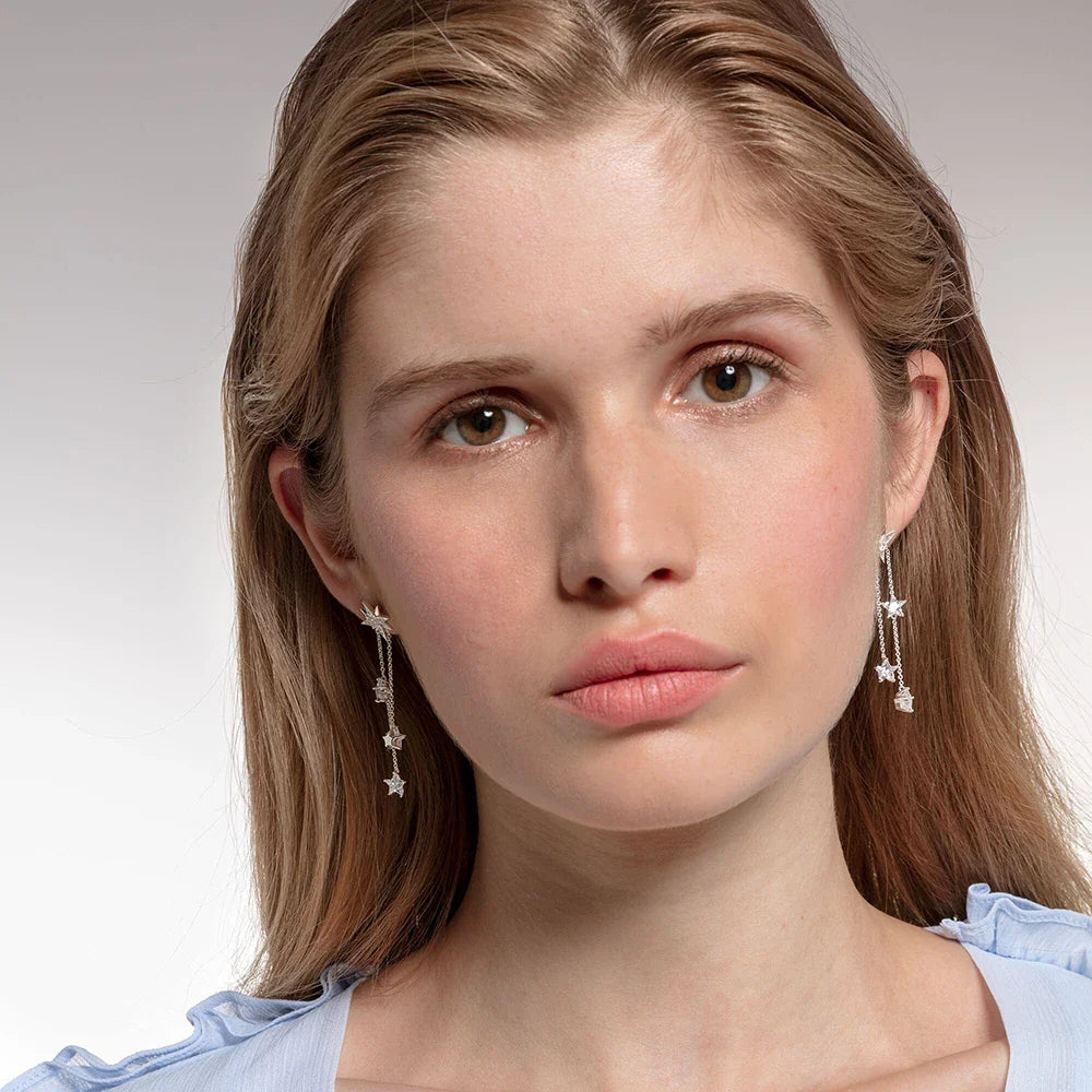Lucky Stars earrings worn with an elegant outfit