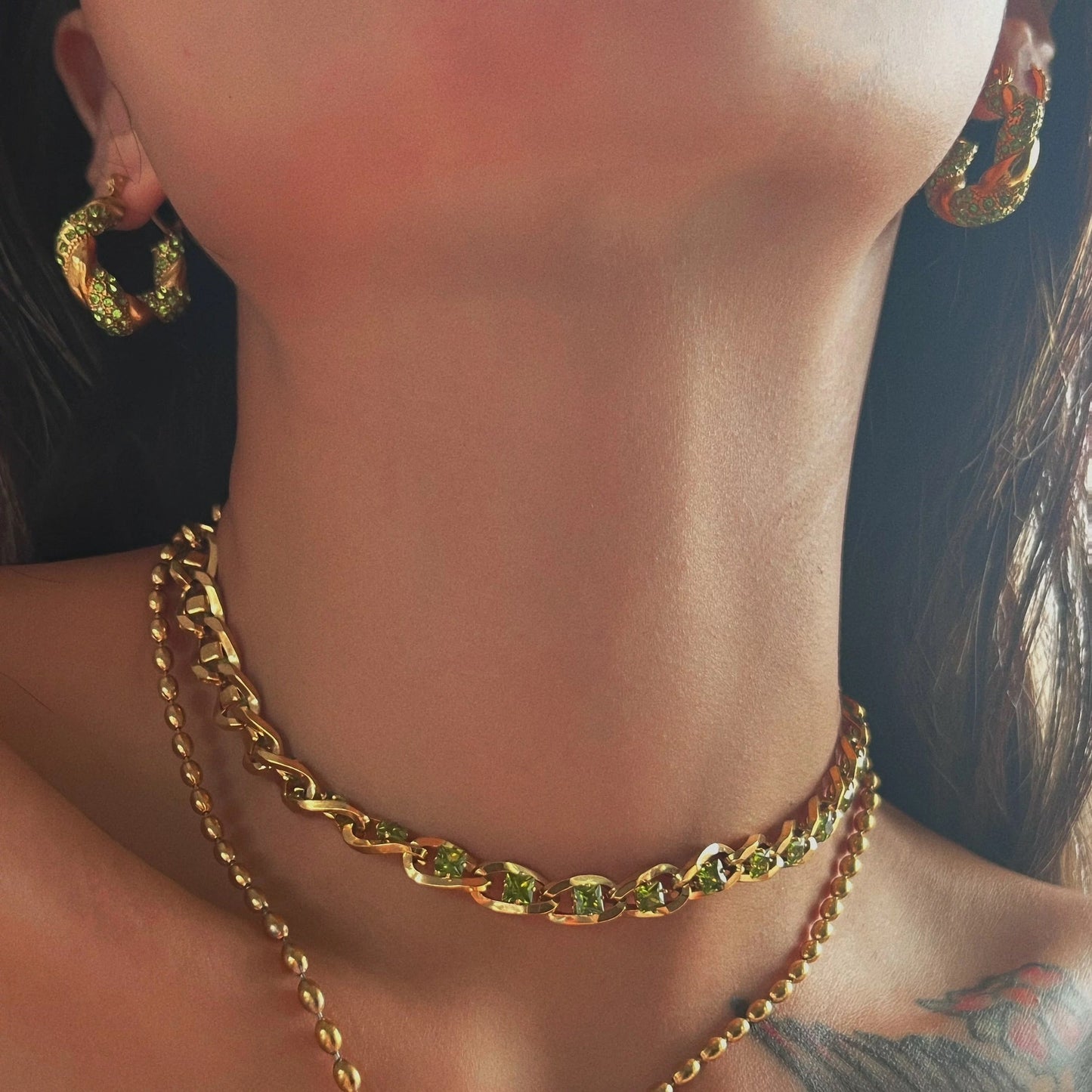 Size comparison of MADDIE hoop earrings with ruler