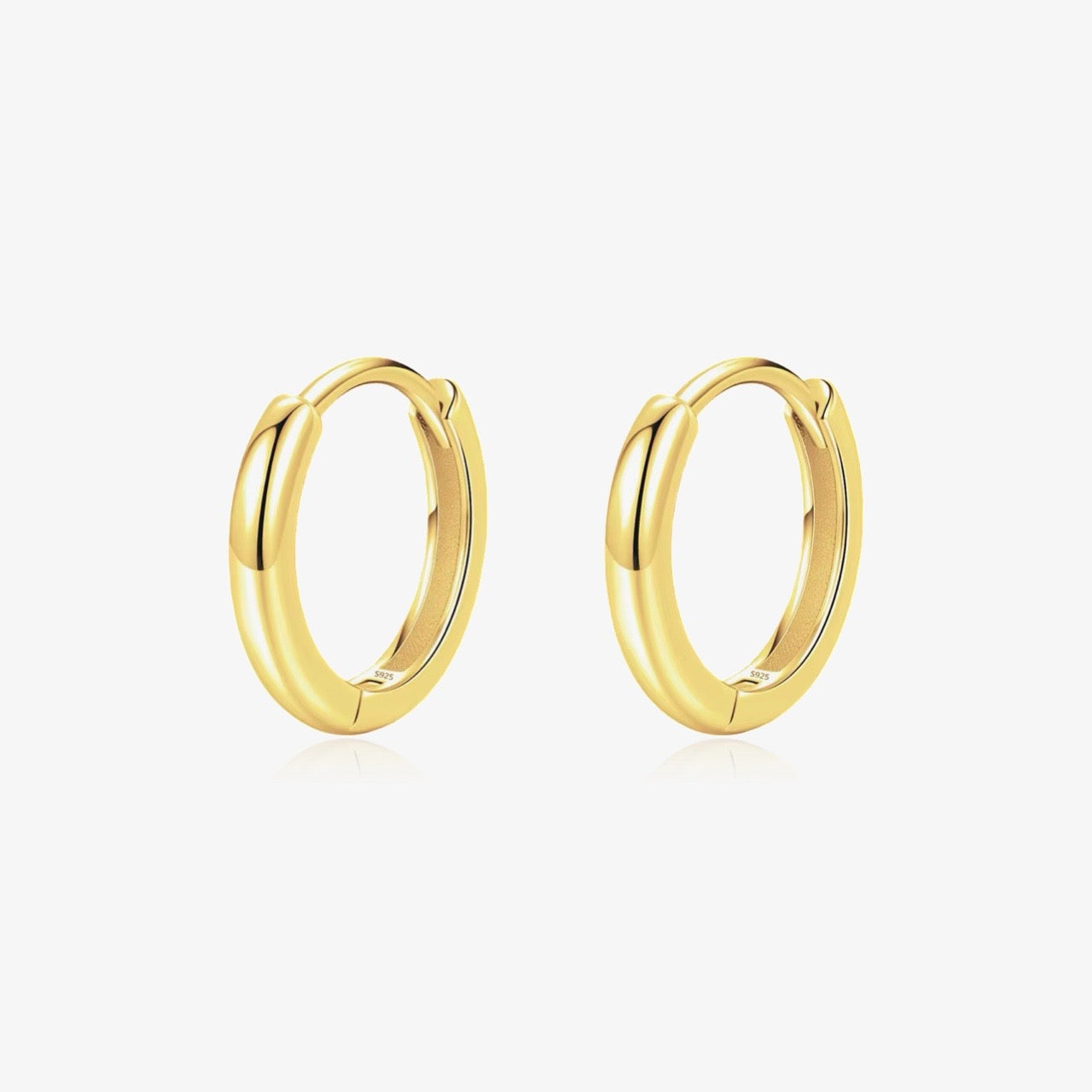 Front view of Mini Huggie earrings in gold