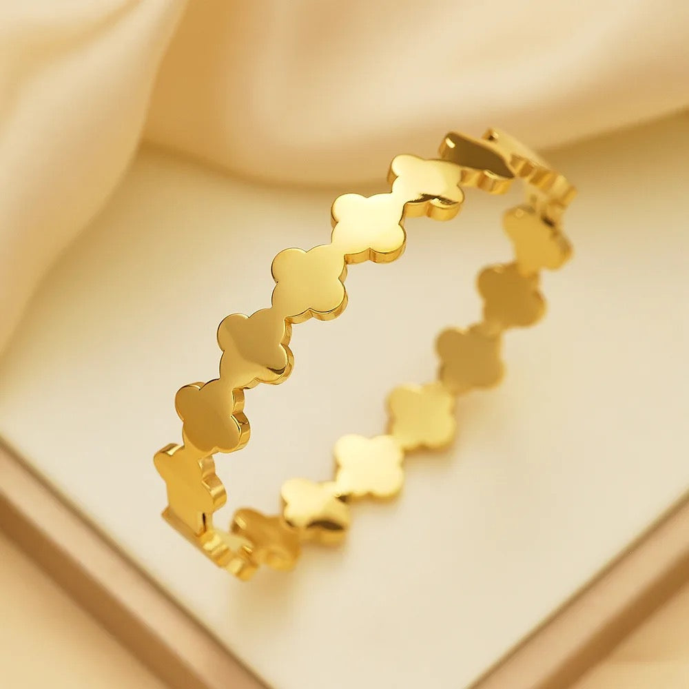 Minimalist clover bracelet styled on wrist