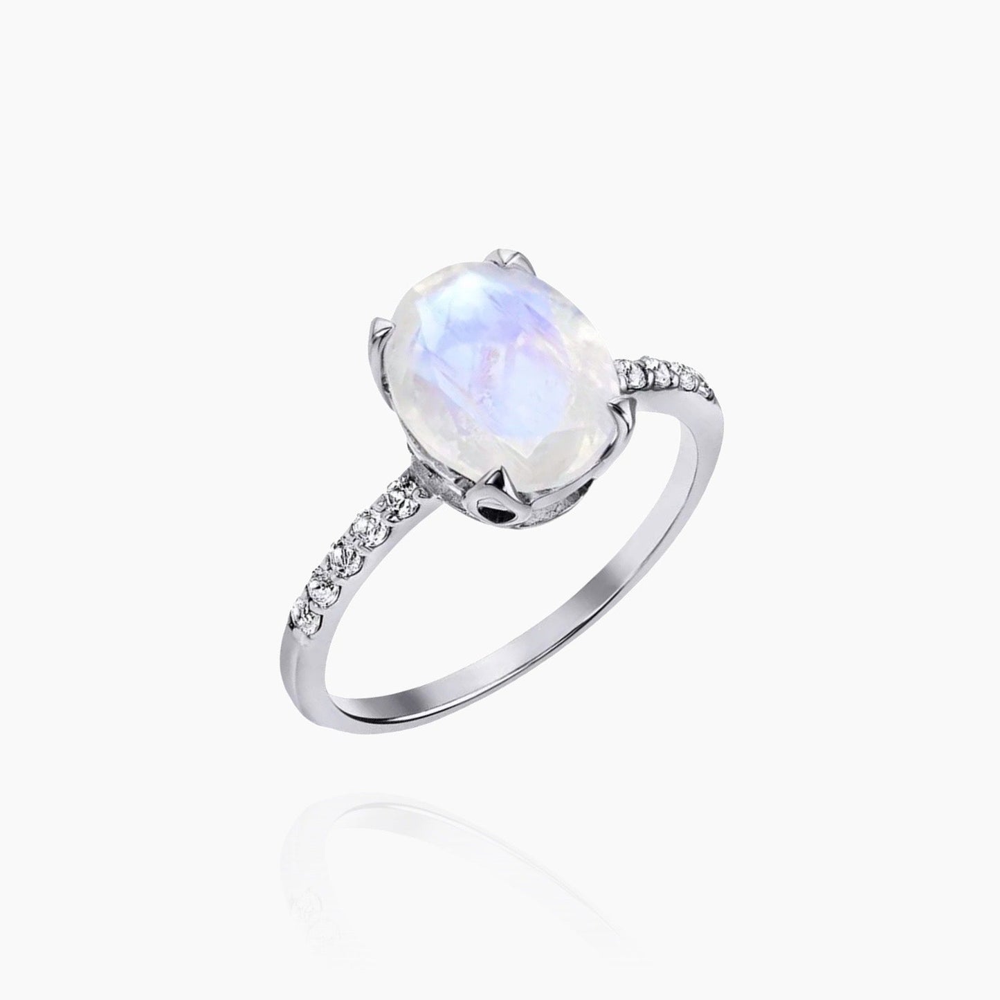 Natural moonstone ring glowing on hand