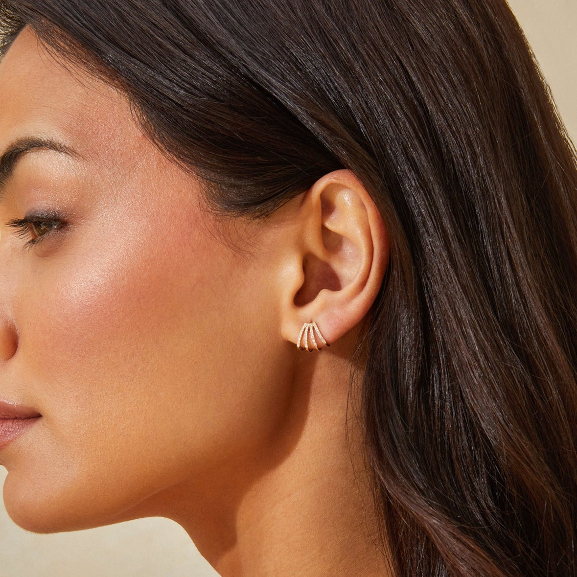 Close-up of pavé crystals on multi hoop earrings