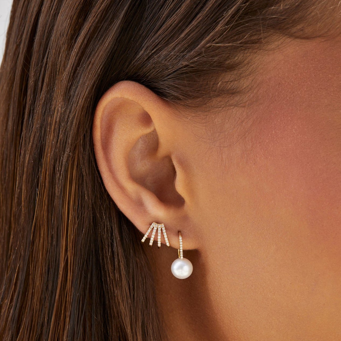 Multi hoop huggie earrings styled in daily wear