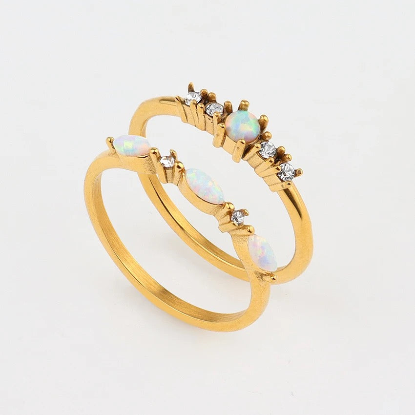 Natural opal gemstone ring reflecting light beautifully