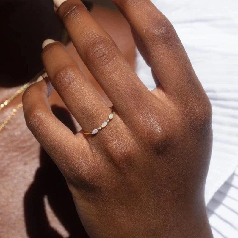 Opal ring layered in boho-chic outfit styling