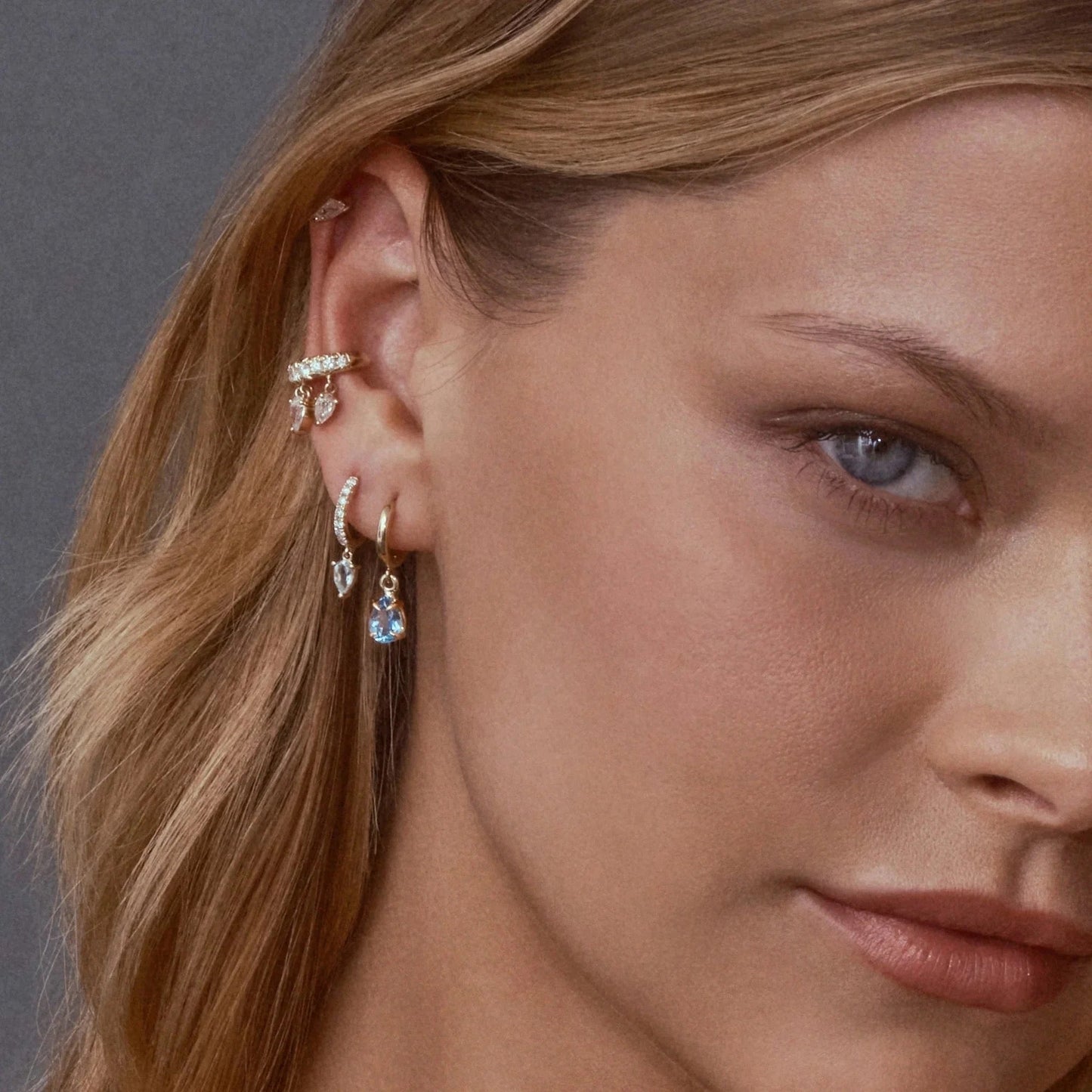 Crystal ear cuff worn on helix and tragus in elegant styling