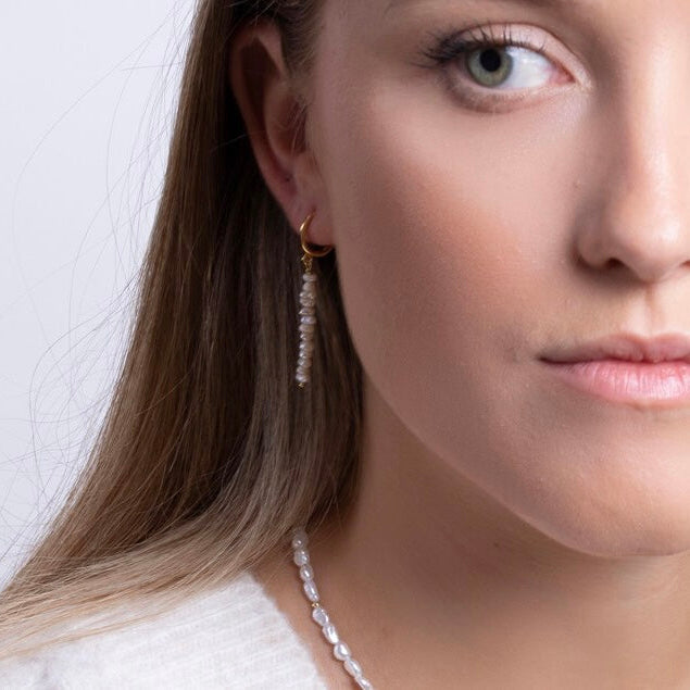 Elegant gift packaging with natural pearl earrings