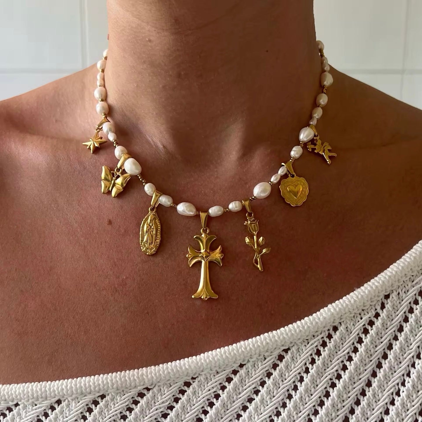 Pearls and Charms Necklace – front view with symbolic charms