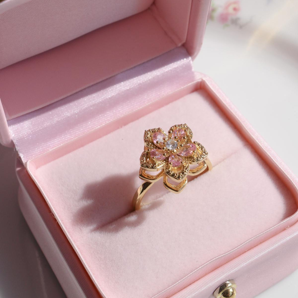 Rapunzel flower fidget ring with spinning petals and zircon center