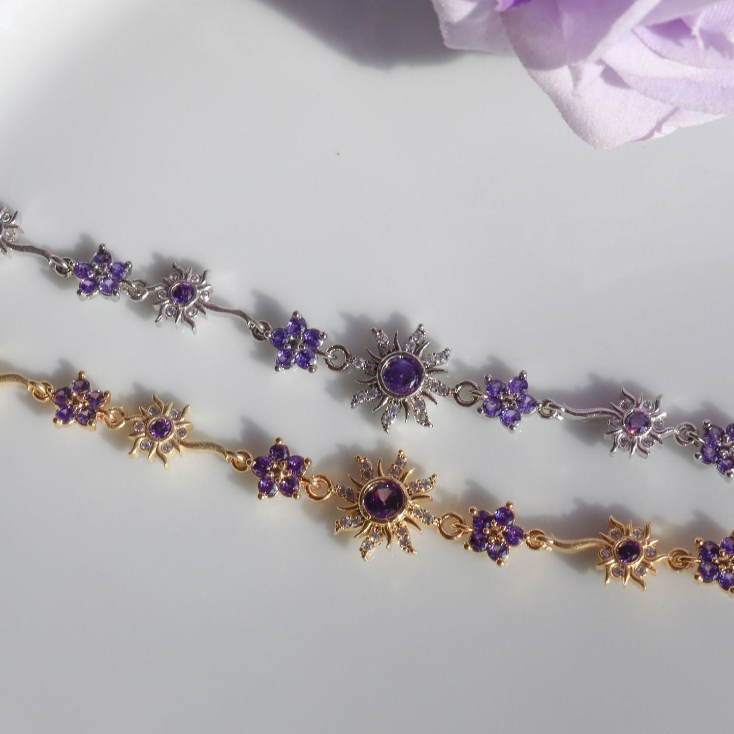 Close-up of Rapunzel sun bracelet with purple stone