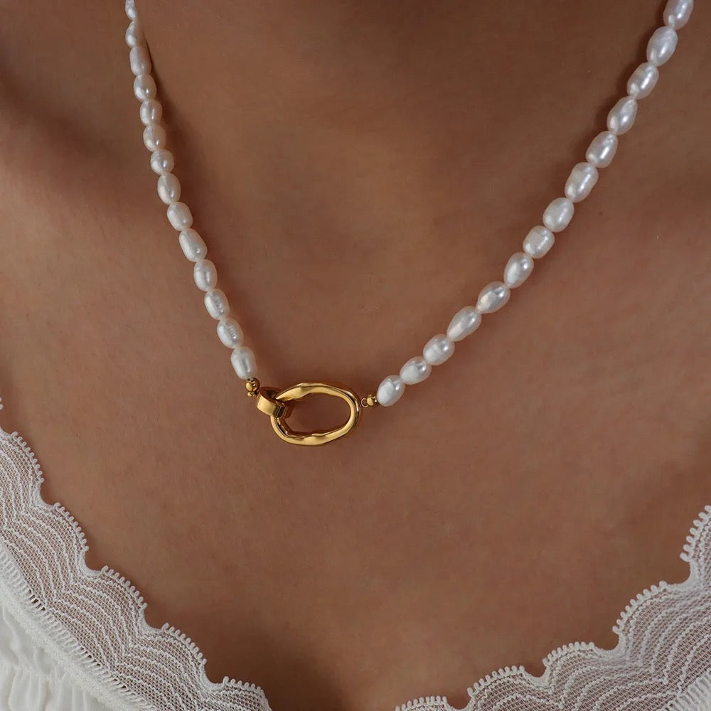 Real pearl necklace styled in layered look