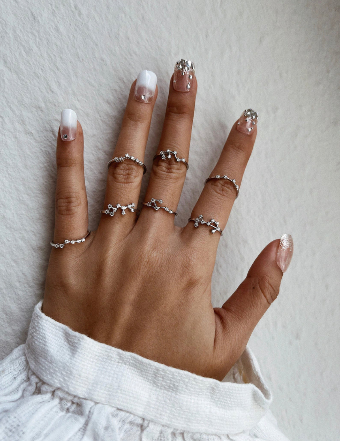 Sterling silver constellation ring styled with casual outfit