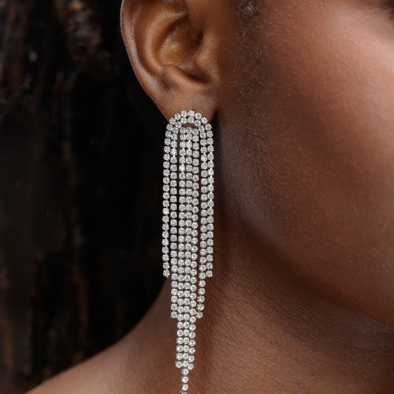 Waterfall Sparkle earrings worn with elegant dress