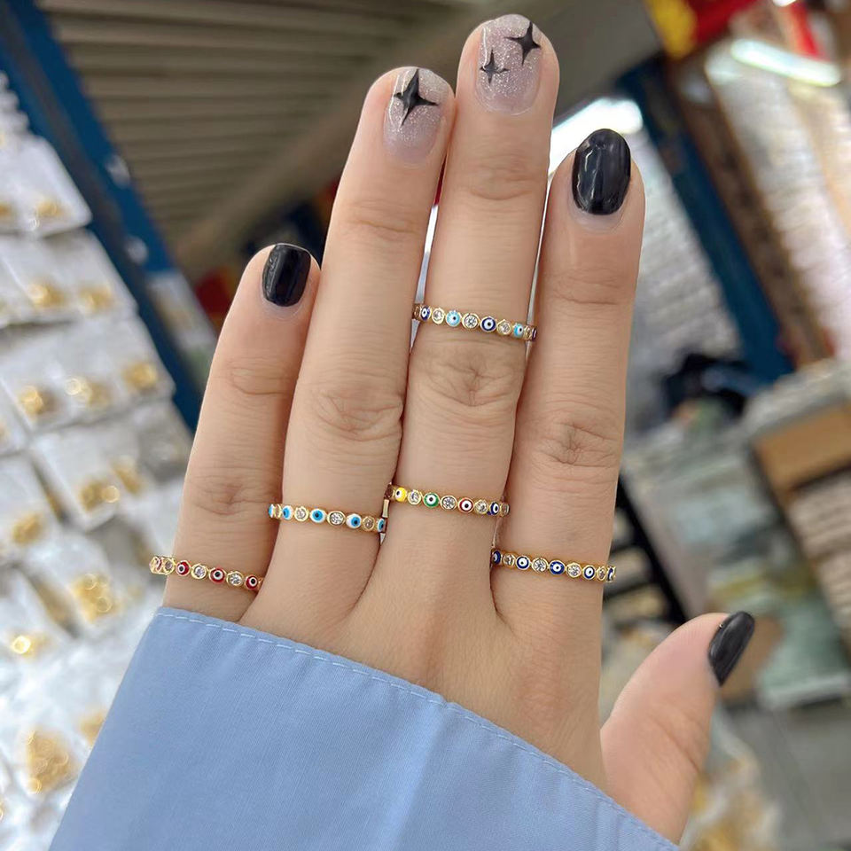 Close-up of Evil Eye ring representing spiritual protection